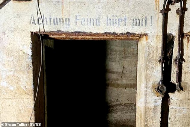 One phrase inside the bunker readsreading 'achtung feind hort mit' - which translates to 'beware, the enemy is listening'