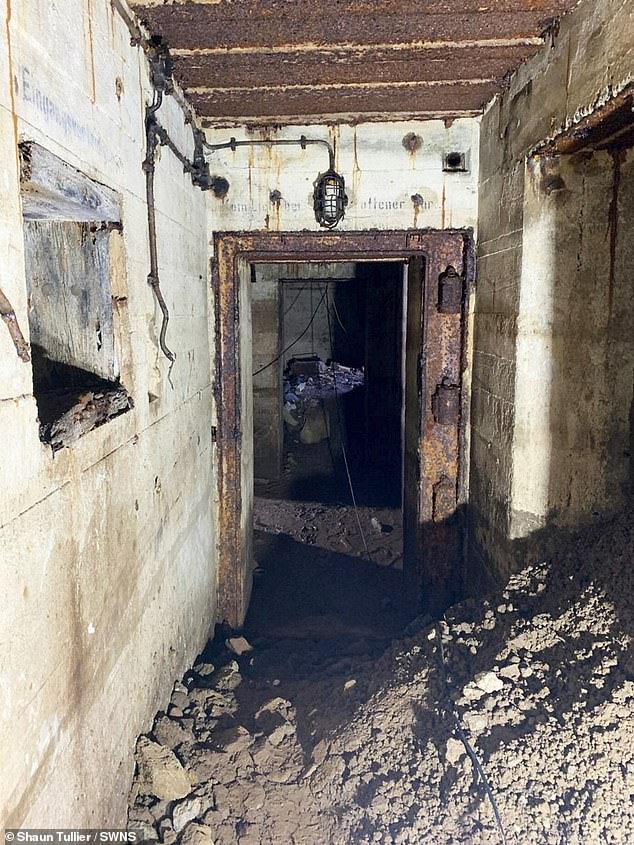 Eerie German phrases were left on the walls of the base, including one reading 'achtung feind hort mit' - which translates to 'beware, the enemy is listening'
