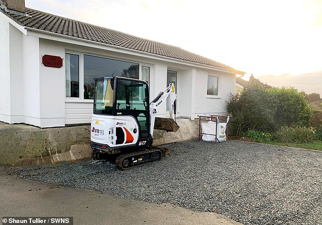 The couple's driveway is seen here just after being renovated - it was dug up just a week after being completed