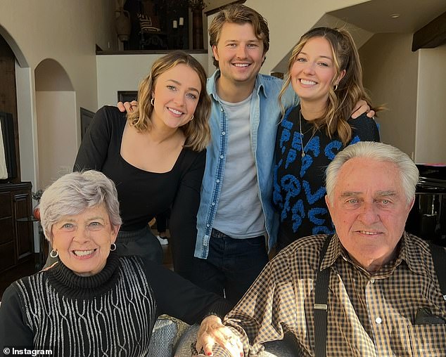Jane and William are pictured with their grandchildren Sidney, Landon and Reagan
