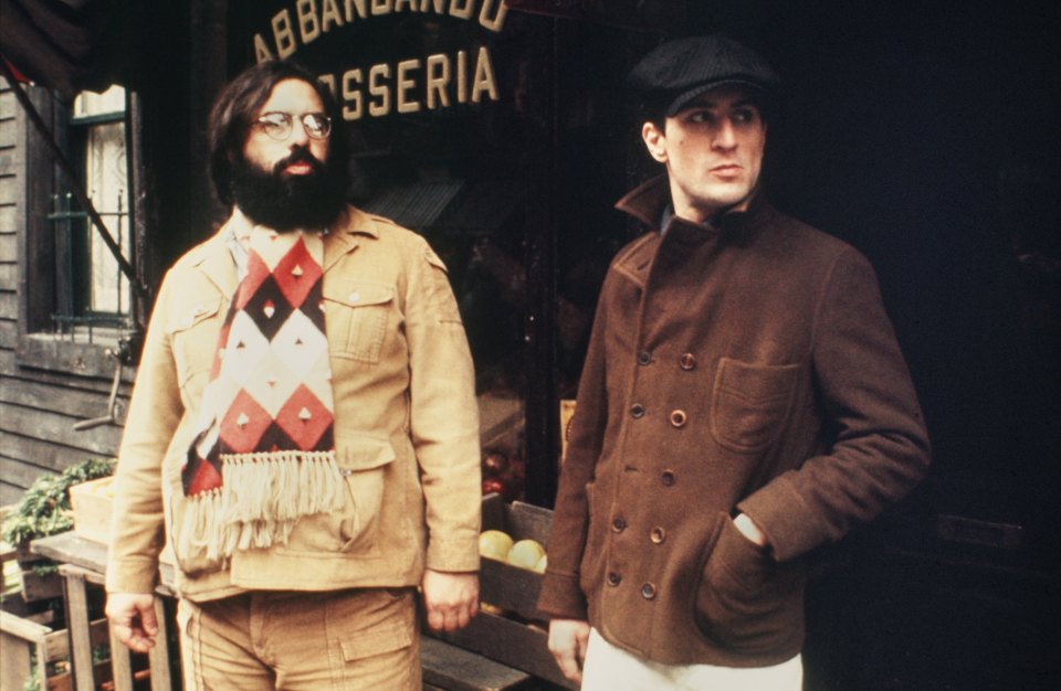 Francis Ford Coppola directing Robert De Niro on the set of *The Godfather Part II*.