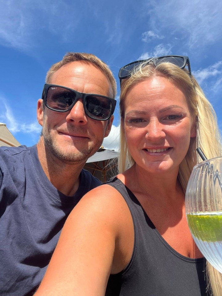 Photo of a couple outdoors.