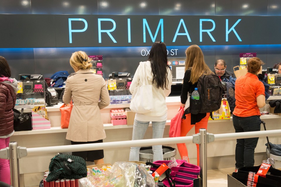 Customers at Primark checkout counters.