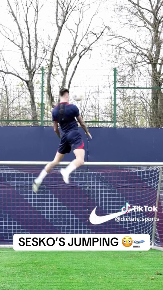 Sesko jumping during RB Leipzig training.