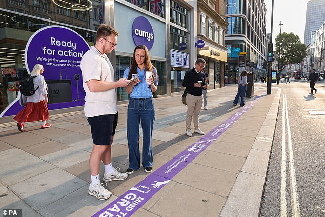 The campaign aims to raise awareness and remind pedestrians to step back from the kerb and keep their phone hidden