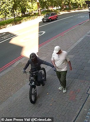 Another unsuspecting man had his mobile snatched in broad daylight by a crook in all black on an e-bike