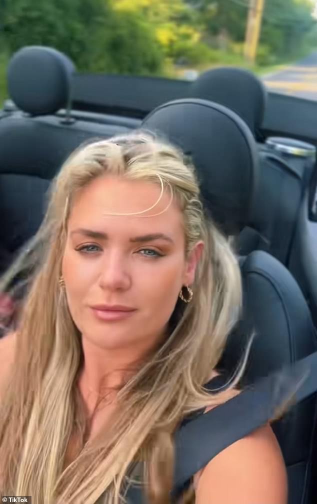 Nolan-O'Slatarra is seen sitting in a luxurious convertible car as it drove through picturesque countryside in a video posted to her TikTok in October last year