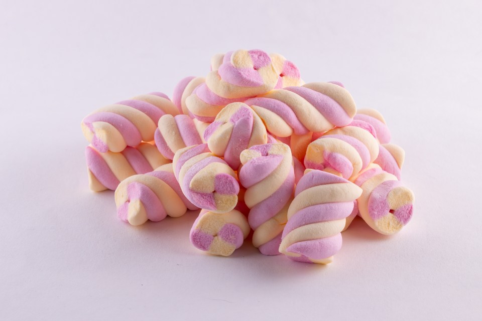 Pink and yellow twisted marshmallows.