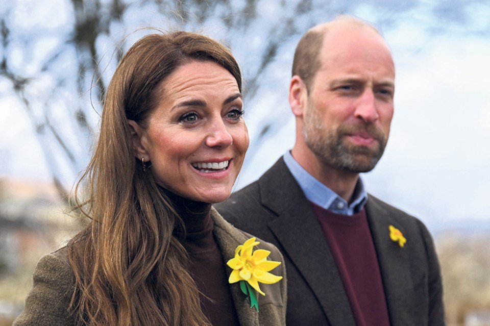 Kate and William Middleton wearing daffodil pins.