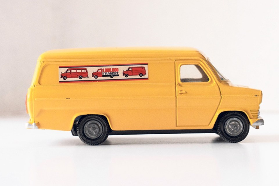 Yellow toy van.