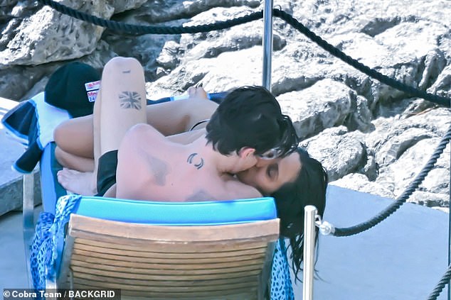 The couple are now very much back on, with Yungblud insisting she's 'the love of his life' and put on a loved-up display while relaxing in the sun