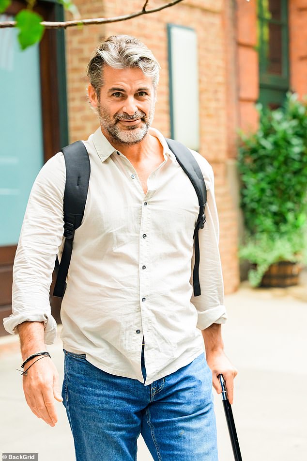 Curtis — who sported shaggy hair and a well-maintained salt-and-pepper beard — held a slim black cane as he limped out to the SUV waiting at the curb