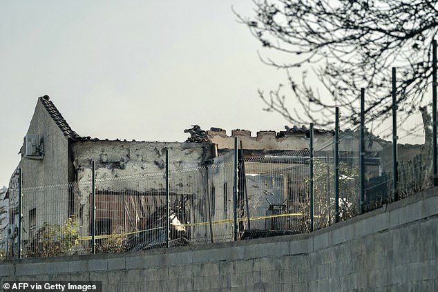 This photograph shows the remains of a home where a woman died due a wildfire brokes out in Saint-Laurent-de-la-Cabreriss