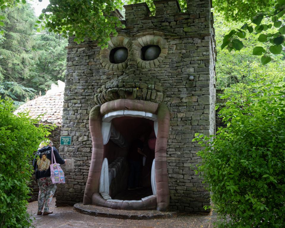 Stone monster structure with an open mouth-shaped entrance.