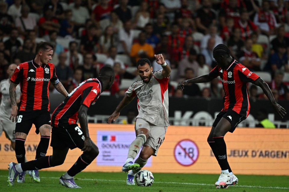 Soccer player controlling the ball during a match.