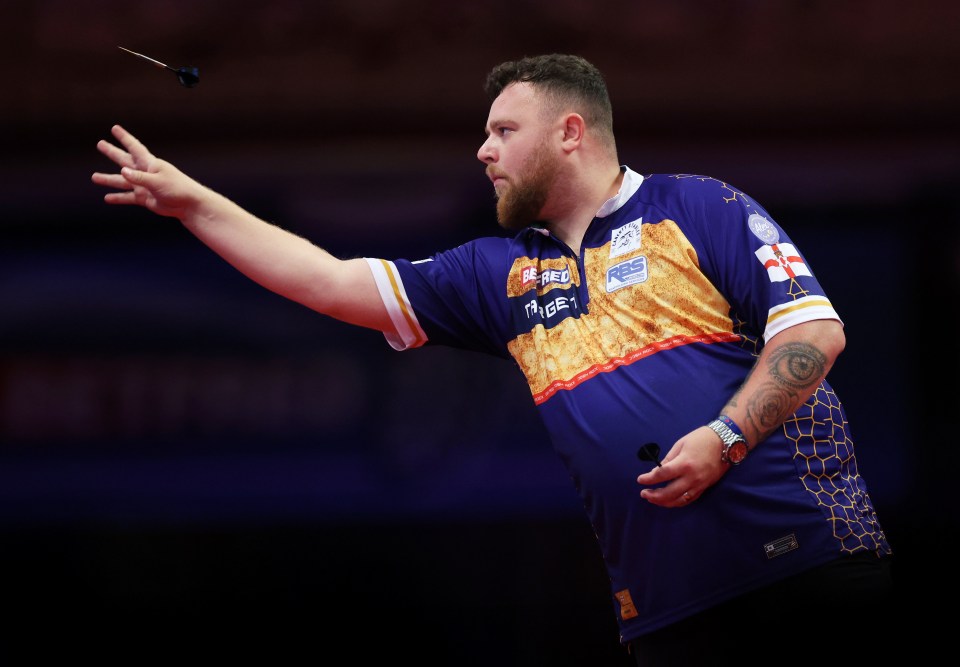 Josh Rock of Northern Ireland throwing a dart.