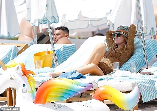 The stunner displayed her sun-kissed skin