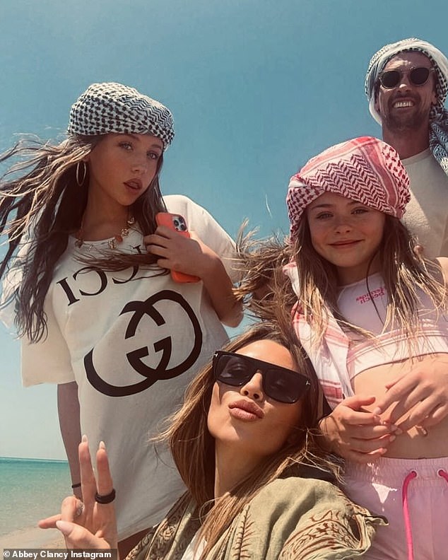 She was joined on the sun-soaked getaway by husband Peter and their four children - Sophia, 14, Liberty, ten, Johnny, seven, and Jack, six; pictured in Qatar in May