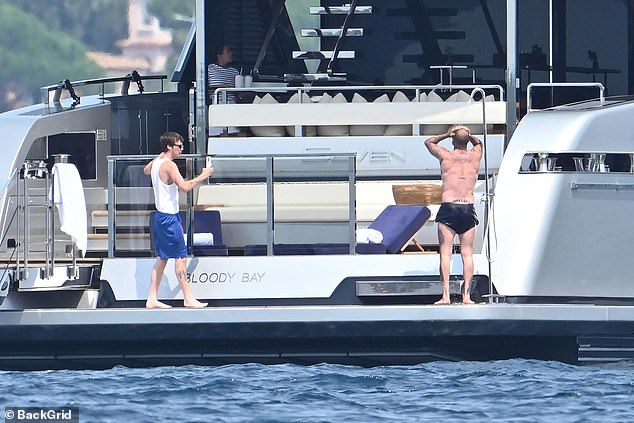 Cruz - the youngest son of the clan - was taking pictures of David showering on the boat