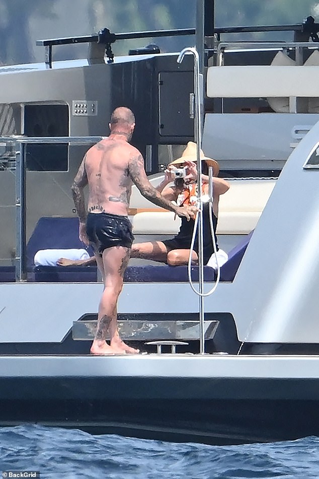 Victoria turned snapper to capture the best shots of her hunky husband in action