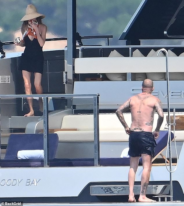 Victoria's lithe legs were on full display in her skimpy black ensemble