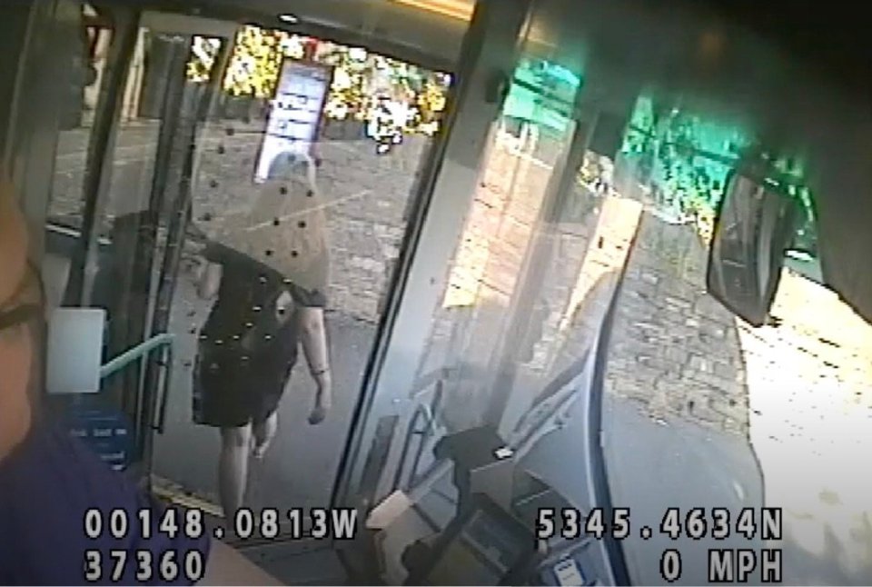 CCTV footage of a woman exiting a bus.