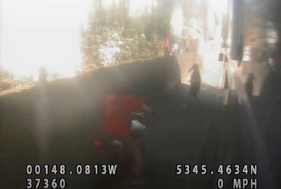 CCTV footage of a motorcyclist crashing into a pedestrian.
