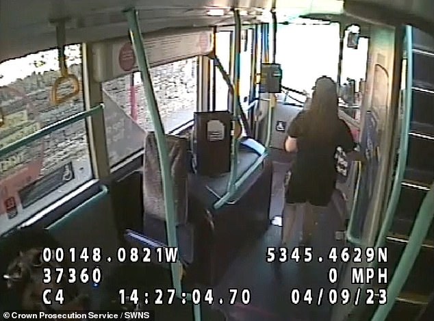 Video shows Ms Marriott, dressed in shorts, t-shirt and a baseball cap and carrying a canned drink, walking along the interior of the bus as it slows to a halt