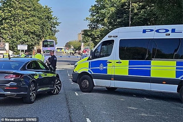 Police vehicles pictured at the scene. Ms Marriott underwent two operations and a skin graft for a wound on her leg, and had to wear a metal cage on her leg for 14 months