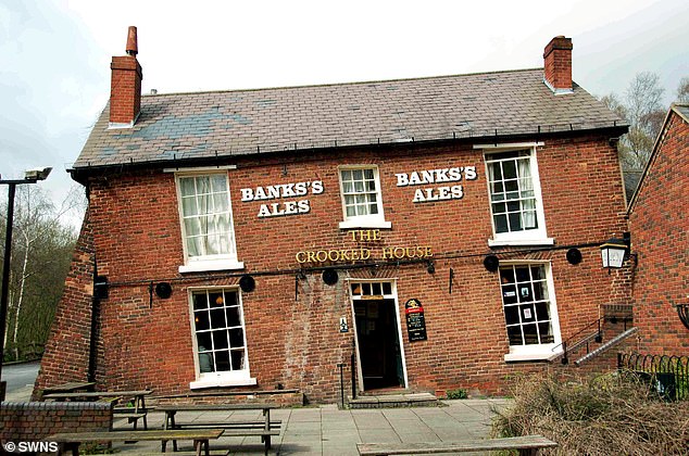 The Crooked House (pictured before the fire), in the village of Himley, Staffordshire, was gutted after a suspected arson attack in August 2023 - two years ago this week