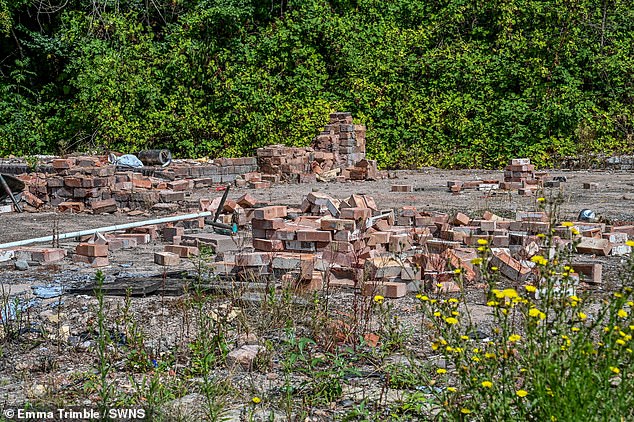Its plight and that of other heritage pubs illegally bulldozed have now been brought up in Parliament a number of times. Pictured: The site two years on from the blaze