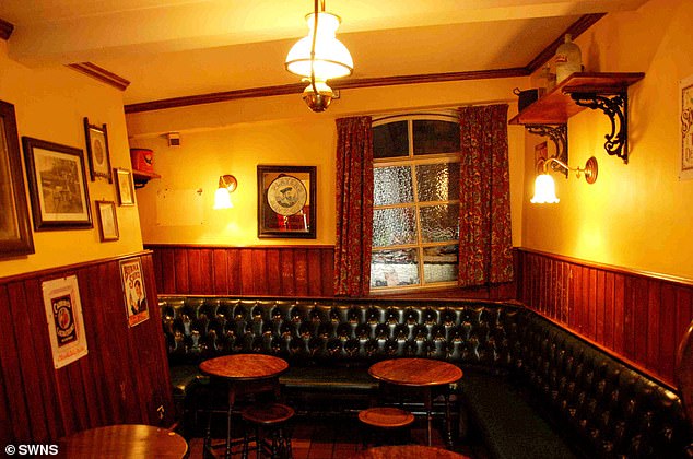 ATE Farms' appeal against being order to rebuild the pub (pictured before the fire) has been delayed until after the police investigation into the suspected arson has finished