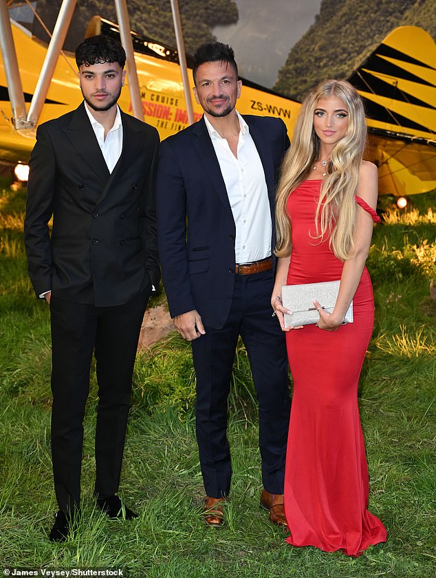 Katie added that Princess' management thought of her as 'trash', before claiming that she was deliberately cut out of the show because she's 'not welcome' (Princess, Peter and Junior pictured in May)