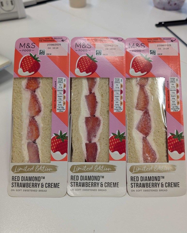 Three M&S Red Diamond Strawberry & Creme sandwiches on soft sweetened bread.