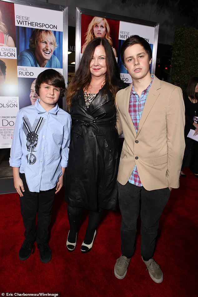 LAPD's Pacific Division spokesperson informed the outlet that 'they would not be releasing a mugshot' for Norfleet (R, seen in 2010), whose mother is the 88-year-old movie star's daughter Jennifer Nicholson (M)