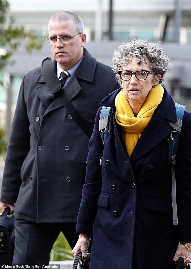Homicide Squad Senior Constable Stephen Eppingstall did everything he could to provide Simon Patterson justice, but was halted by the justice system.  He is seen entering the court with prosecutor Dr Nanette Rogers