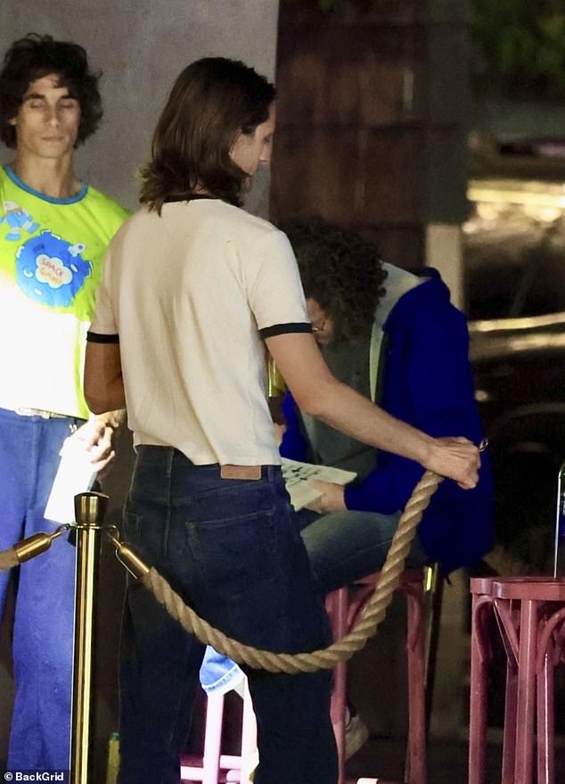 Hynes White was seen letting bar patrons through
