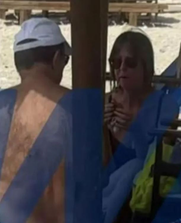 Michele Ann Joy Bourda and her husband on a beach three hours before she disappeared.