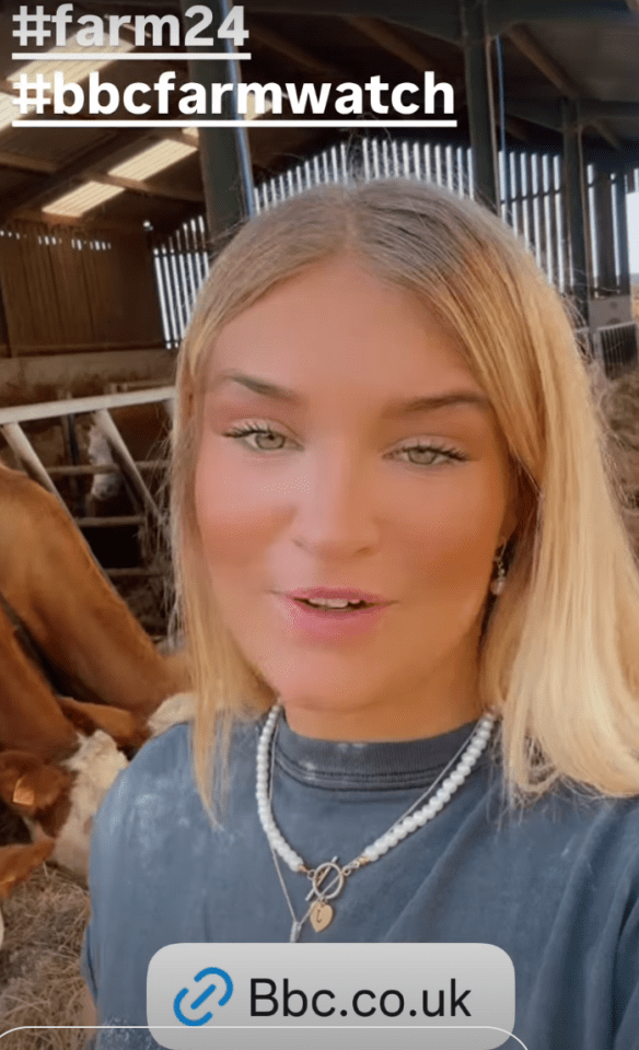 Woman in barn speaking to camera; link to bbc.co.uk.