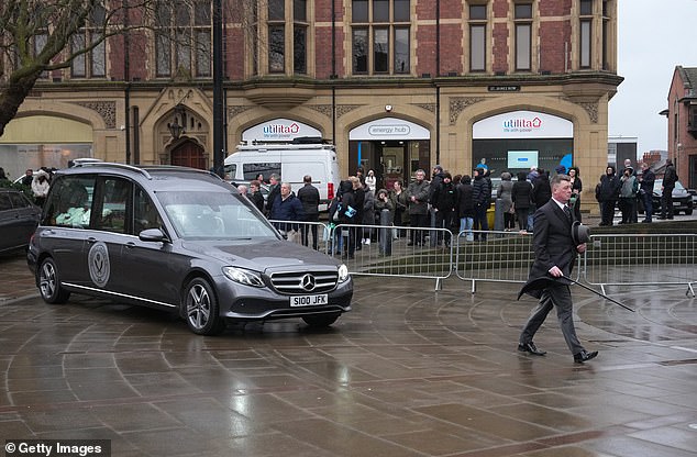 The hearse carrying Harvey pictured at his funeral, which attracted hundreds of mourners in Sheffield in February