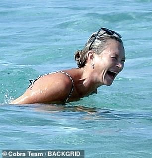 Kate's beach babe look saw her go make-up free and showcase her smooth visage, which has left tongues wagging over the years about possible cosmetic work