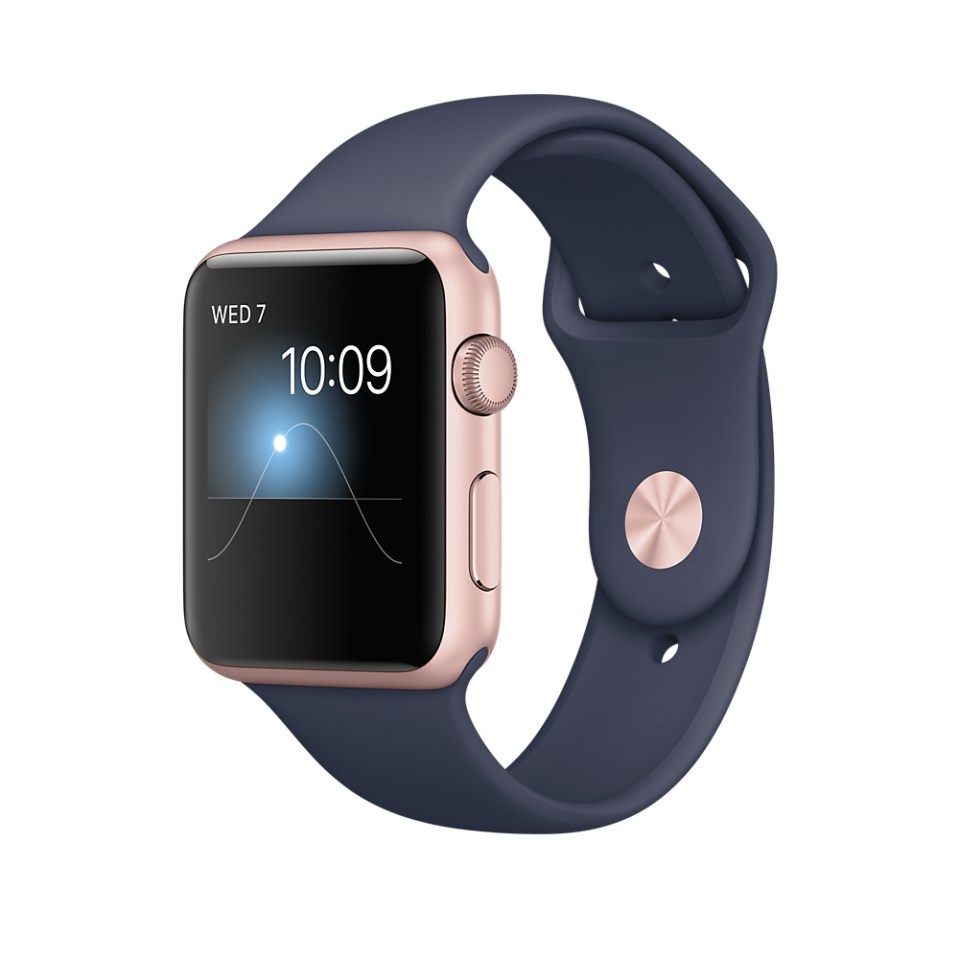 Rose gold Apple Watch with midnight blue band.