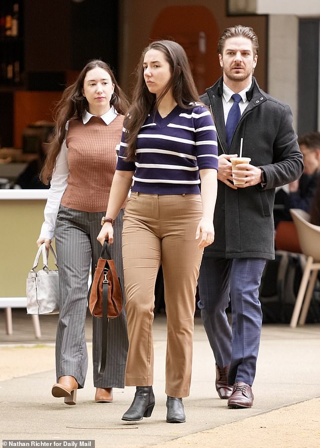 Davidson and his dead wife's two daughters Robyn and Brooke (above) arrive at Brisbane Supreme Court on Friday morning for their father's bail determination