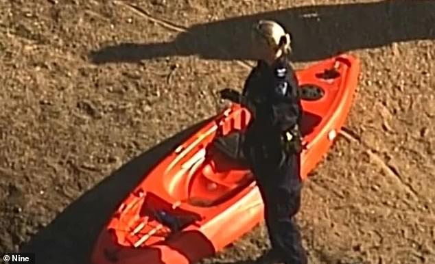 Ms Davidson was unable to be revived after she drowned on a trip on Lake Samsonvale, near Forgan Cove in Queensland's Moreton Bay region, in late 2020 (pictured, police at the scene)