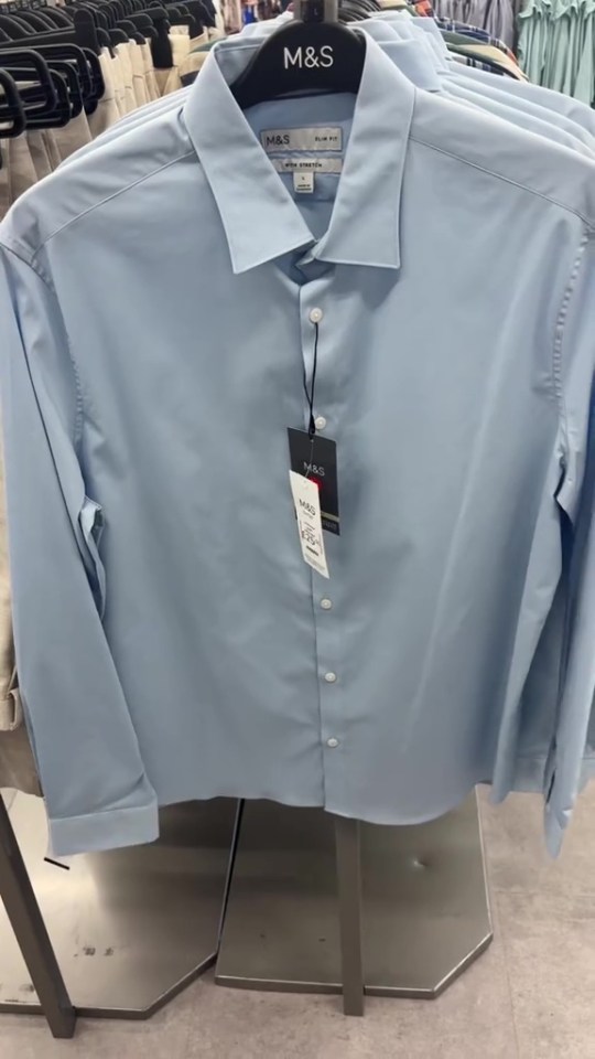 Light blue M&S men's shirt on display.