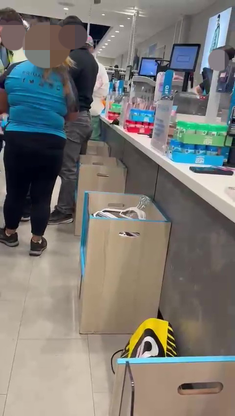 Primark worker and customer fighting in store.