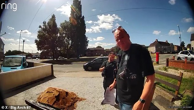 Footage shows the Warwickshire officer hesitantly approaching the Nuneaton property before ringing the doorbell