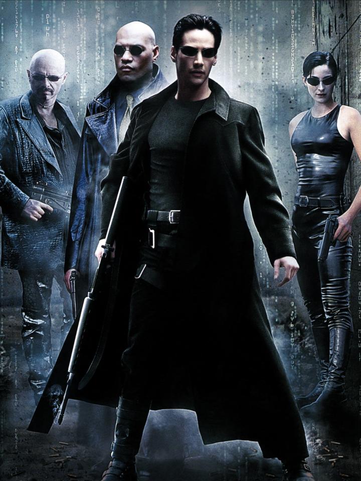 The Matrix movie poster featuring Keanu Reeves, Laurence Fishburne, Carrie-Anne Moss, and Hugo Weaving.