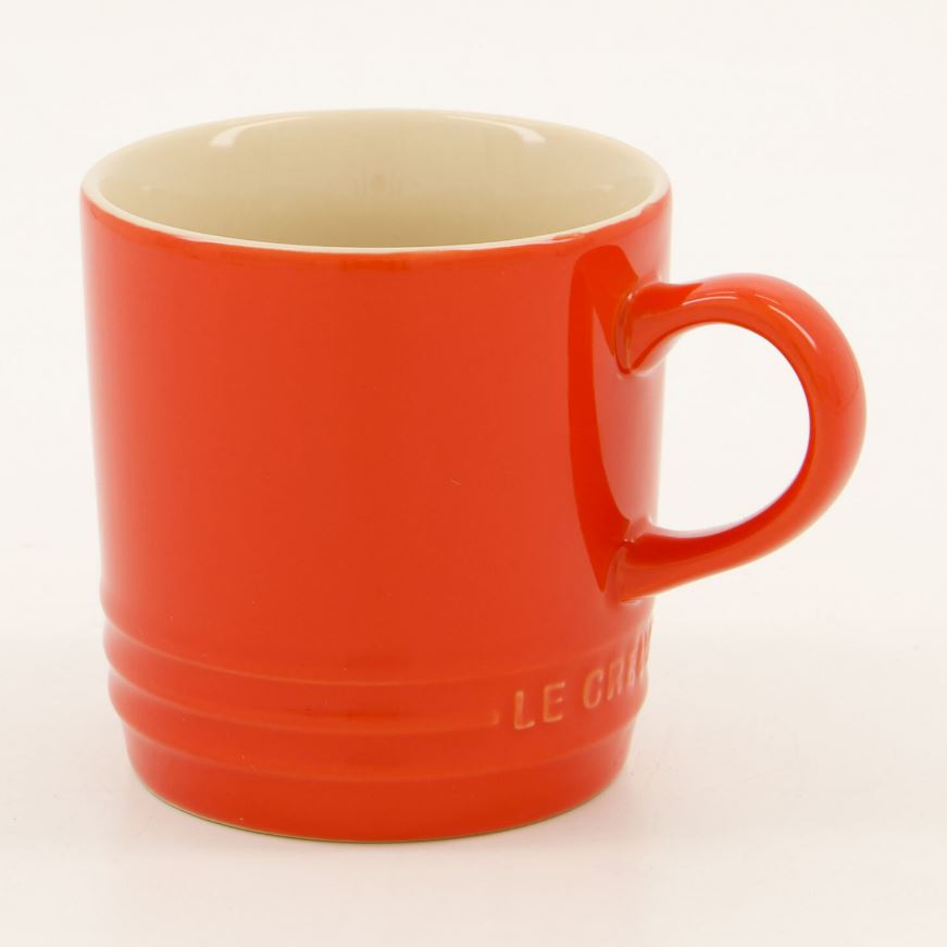 Orange Le Creuset mug.