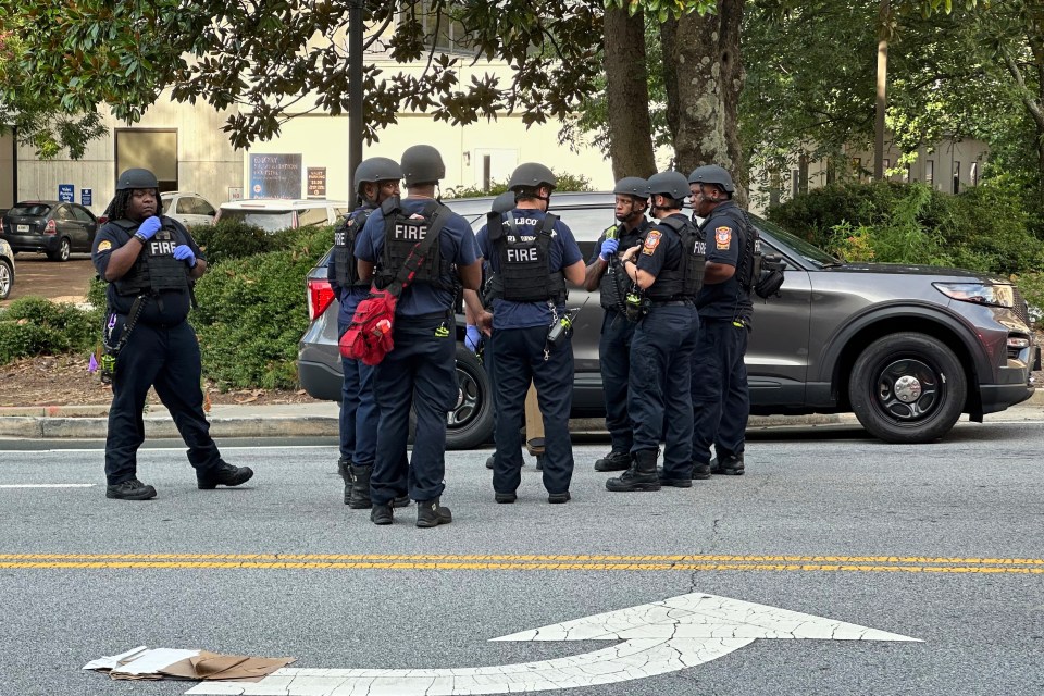 DeKalb County firefighters gathered outside a medical building.